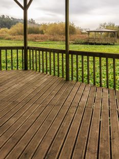 wooden-fence-field-against-sky